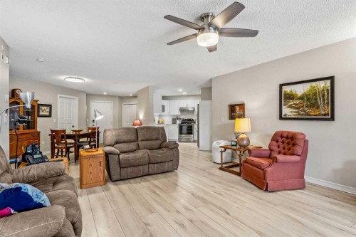 2111 Millrise Point Sw, Calgary, AB - Indoor Photo Showing Living Room