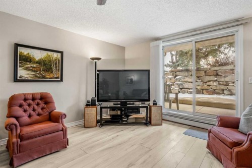 2111 Millrise Point Sw, Calgary, AB - Indoor Photo Showing Living Room