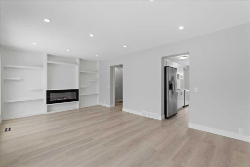172 Abinger Crescent Ne, Calgary, AB - Indoor With Fireplace