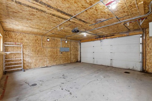 77 Bridleglen Road Sw, Calgary, AB - Indoor Photo Showing Garage