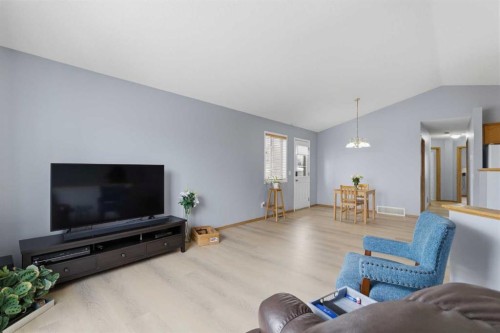 77 Bridleglen Road Sw, Calgary, AB - Indoor Photo Showing Living Room