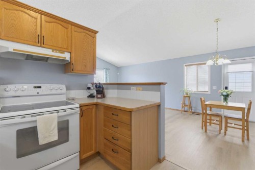 77 Bridleglen Road Sw, Calgary, AB - Indoor Photo Showing Kitchen