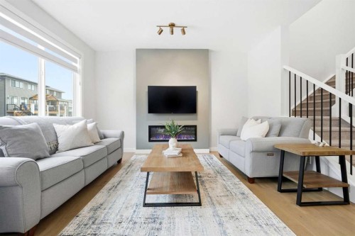 316 Precedence Hill, Cochrane, AB - Indoor Photo Showing Living Room