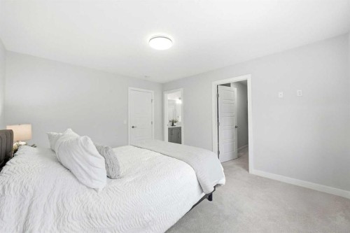 316 Precedence Hill, Cochrane, AB - Indoor Photo Showing Bedroom