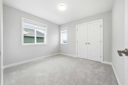 316 Precedence Hill, Cochrane, AB - Indoor Photo Showing Other Room