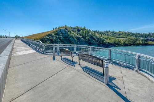 316 Precedence Hill, Cochrane, AB - Outdoor With Body Of Water