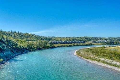 316 Precedence Hill, Cochrane, AB - Outdoor With Body Of Water With View