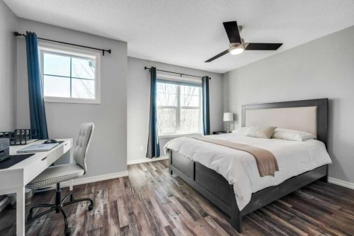 731-101 Sunset Drive, Cochrane, AB - Indoor Photo Showing Bedroom