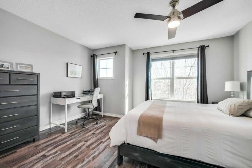 731-101 Sunset Drive, Cochrane, AB - Indoor Photo Showing Bedroom