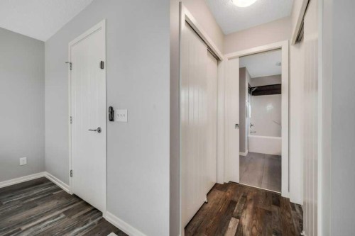 731-101 Sunset Drive, Cochrane, AB - Indoor Photo Showing Other Room
