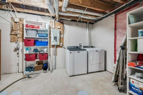 731-101 Sunset Drive, Cochrane, AB - Indoor Photo Showing Laundry Room