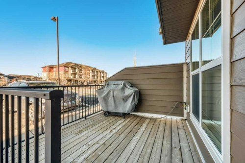 731-101 Sunset Drive, Cochrane, AB - Outdoor With Deck Patio Veranda With Exterior