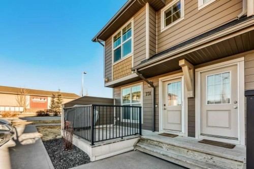 731-101 Sunset Drive, Cochrane, AB - Outdoor With Deck Patio Veranda