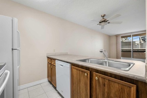 1209-738 3 Avenue Sw, Calgary, AB - Indoor Photo Showing Kitchen With Double Sink