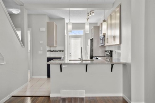 78 New Brighton Landing Se, Calgary, AB - Indoor Photo Showing Kitchen