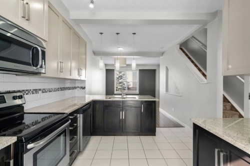 78 New Brighton Landing Se, Calgary, AB - Indoor Photo Showing Kitchen With Stainless Steel Kitchen With Upgraded Kitchen