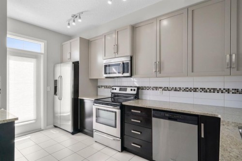 78 New Brighton Landing Se, Calgary, AB - Indoor Photo Showing Kitchen With Stainless Steel Kitchen