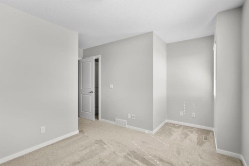78 New Brighton Landing Se, Calgary, AB - Indoor Photo Showing Other Room