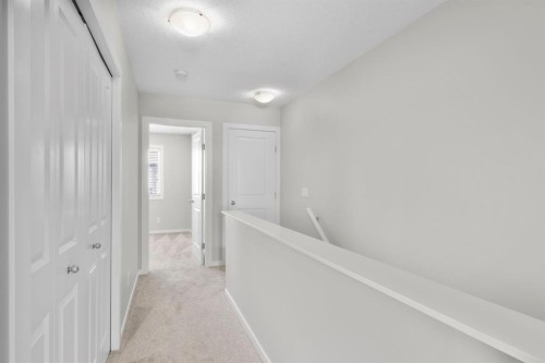 78 New Brighton Landing Se, Calgary, AB - Indoor Photo Showing Other Room