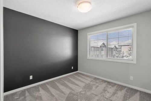 78 New Brighton Landing Se, Calgary, AB - Indoor Photo Showing Other Room