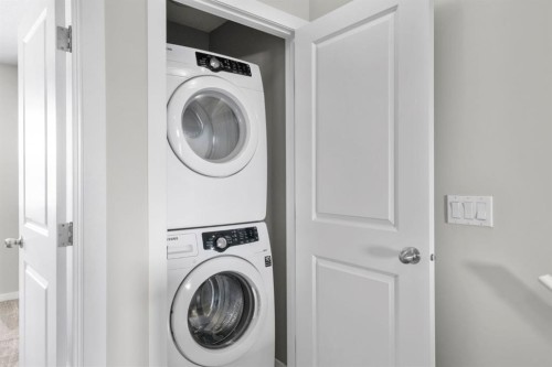 78 New Brighton Landing Se, Calgary, AB - Indoor Photo Showing Laundry Room