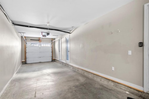 78 New Brighton Landing Se, Calgary, AB - Indoor Photo Showing Garage