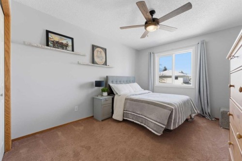 88 Sunmeadows Road Se, Calgary, AB - Indoor Photo Showing Bedroom