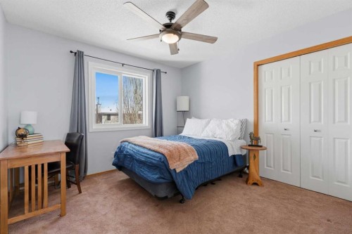 88 Sunmeadows Road Se, Calgary, AB - Indoor Photo Showing Bedroom
