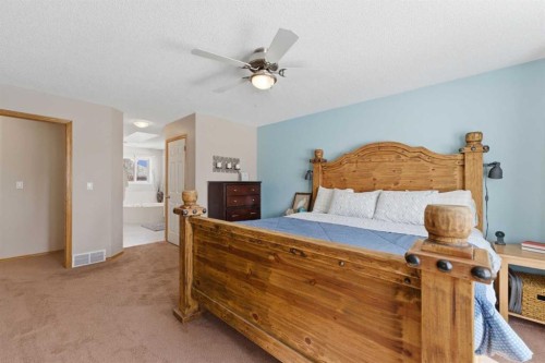 88 Sunmeadows Road Se, Calgary, AB - Indoor Photo Showing Bedroom