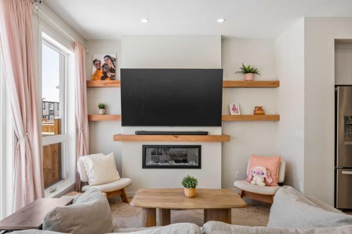 234 Magnolia Way Se, Calgary, AB - Indoor Photo Showing Living Room