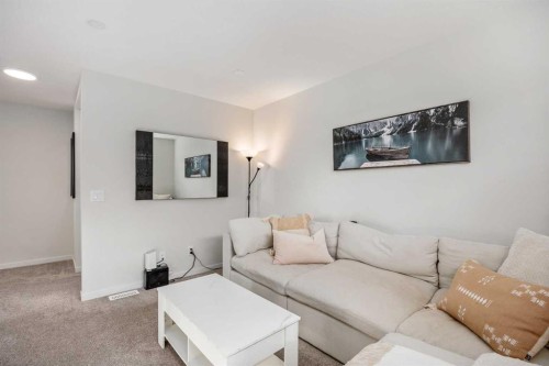 234 Magnolia Way Se, Calgary, AB - Indoor Photo Showing Living Room