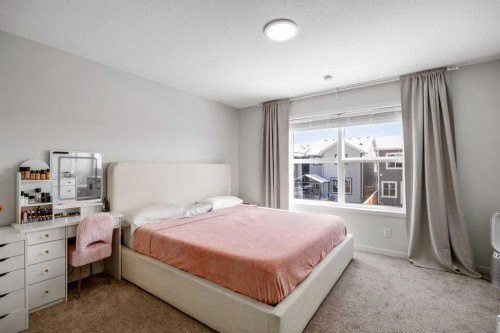 234 Magnolia Way Se, Calgary, AB - Indoor Photo Showing Bedroom