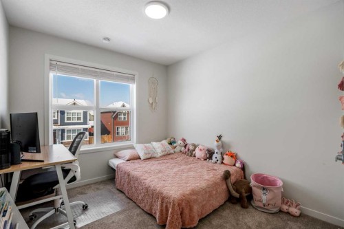234 Magnolia Way Se, Calgary, AB - Indoor Photo Showing Bedroom