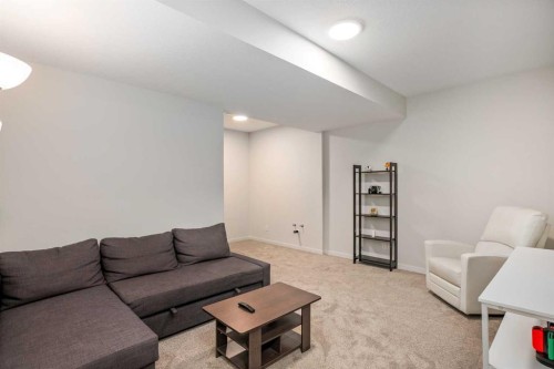 234 Magnolia Way Se, Calgary, AB - Indoor Photo Showing Living Room