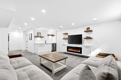 6323 Crowchild Trail Sw, Calgary, AB - Indoor Photo Showing Living Room With Fireplace