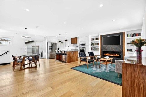 6323 Crowchild Trail Sw, Calgary, AB - Indoor Photo Showing Living Room With Fireplace