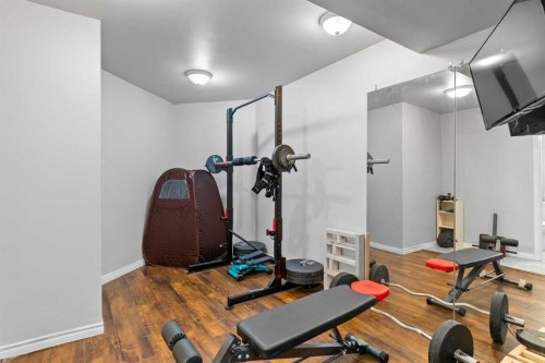 95 Sierra Nevada Green Sw, Calgary, AB - Indoor Photo Showing Gym Room