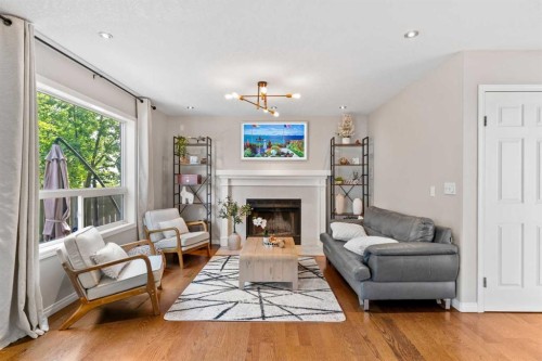 95 Sierra Nevada Green Sw, Calgary, AB - Indoor Photo Showing Living Room With Fireplace