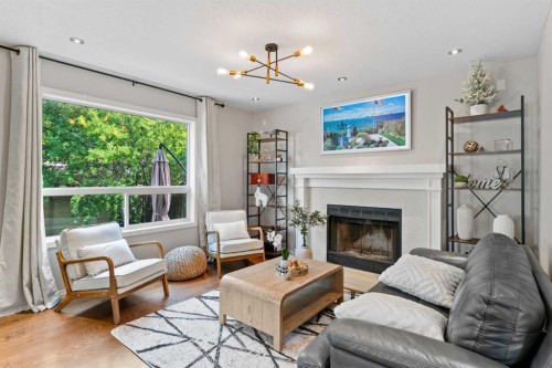 95 Sierra Nevada Green Sw, Calgary, AB - Indoor Photo Showing Living Room With Fireplace