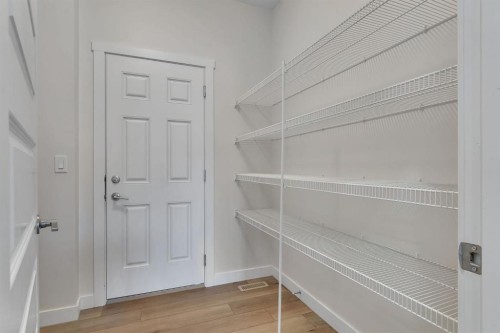 1489 Bayview Point Sw, Airdrie, AB - Indoor With Storage