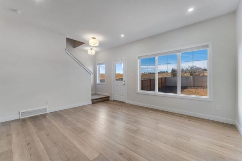 1489 Bayview Point Sw, Airdrie, AB - Indoor Photo Showing Other Room