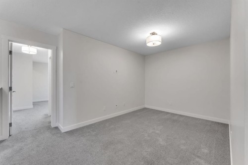 1489 Bayview Point Sw, Airdrie, AB - Indoor Photo Showing Other Room