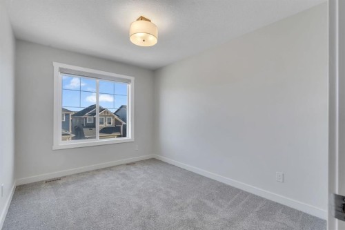 1489 Bayview Point Sw, Airdrie, AB - Indoor Photo Showing Other Room