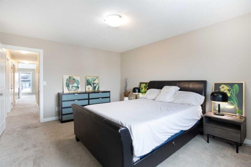 147 Morningside Mews Sw, Airdrie, AB - Indoor Photo Showing Bedroom