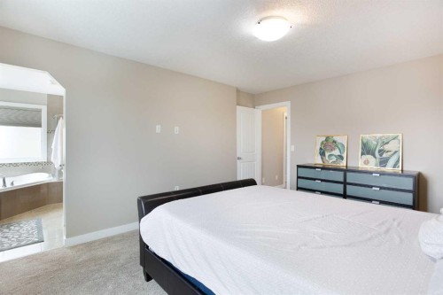 147 Morningside Mews Sw, Airdrie, AB - Indoor Photo Showing Bedroom