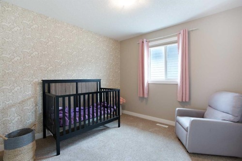 147 Morningside Mews Sw, Airdrie, AB - Indoor Photo Showing Bedroom