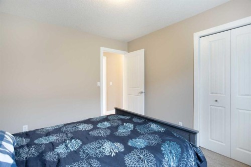 147 Morningside Mews Sw, Airdrie, AB - Indoor Photo Showing Bedroom