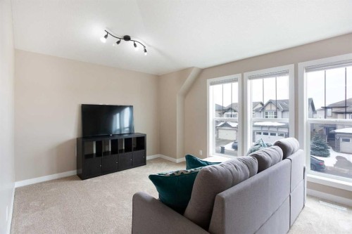147 Morningside Mews Sw, Airdrie, AB - Indoor Photo Showing Living Room