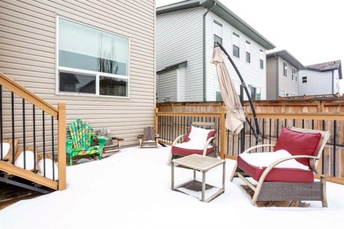 147 Morningside Mews Sw, Airdrie, AB - Outdoor With Deck Patio Veranda With Exterior