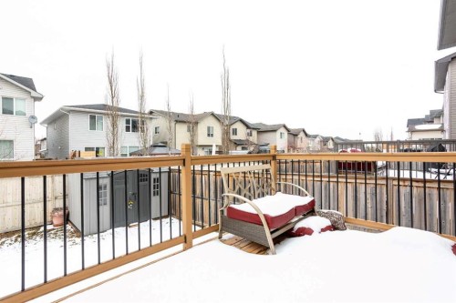 147 Morningside Mews Sw, Airdrie, AB - Outdoor With Deck Patio Veranda With Exterior